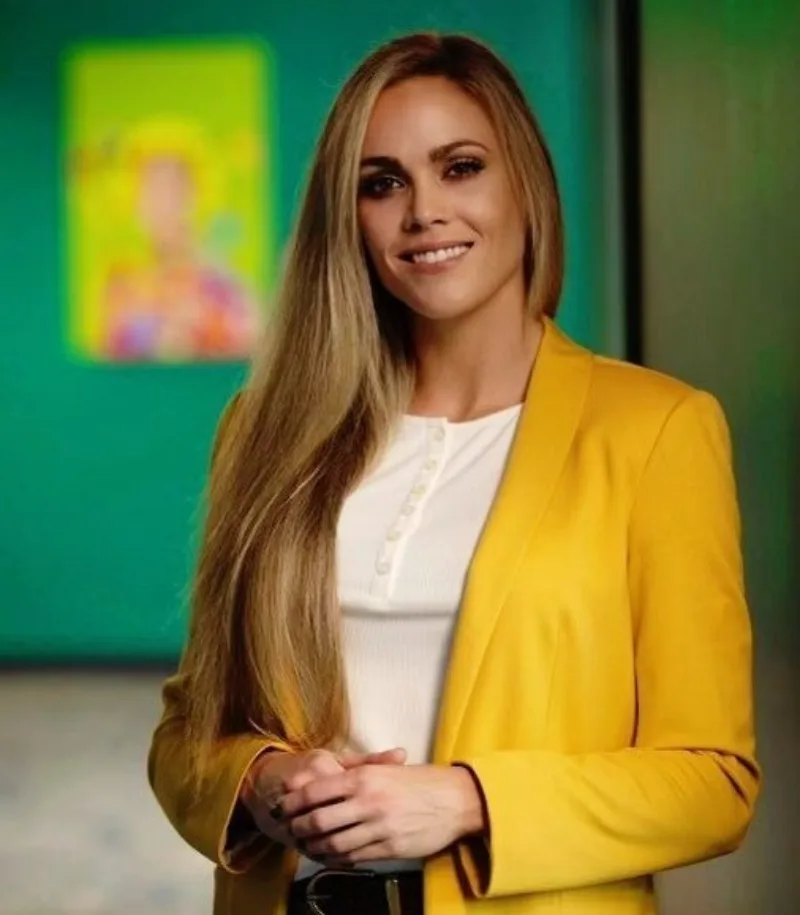 A woman with a yellow jacket