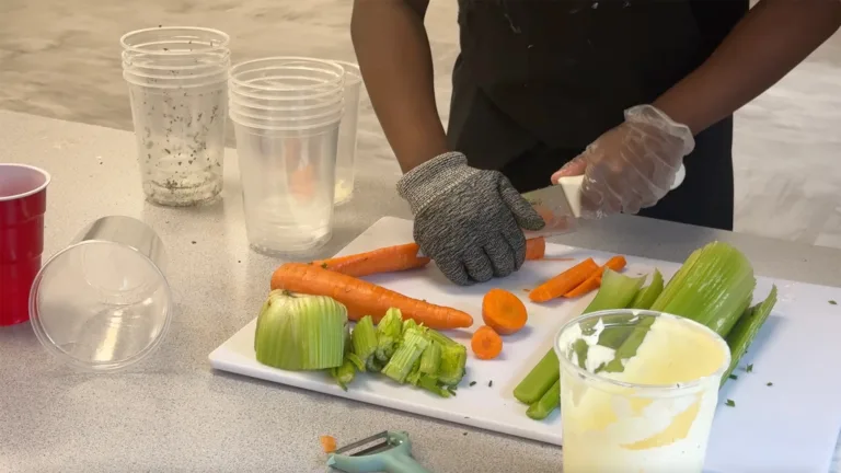 Junior chef chopping vegetables